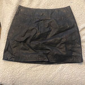 Black leather mini skirt